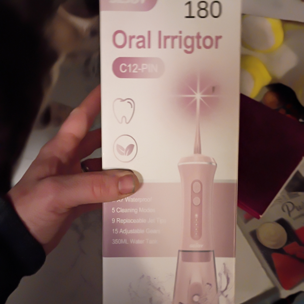 Oral Irrigator with Multiple Cleaning Modes - Pink